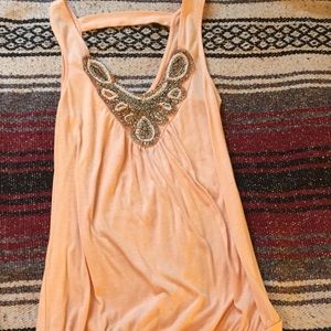 Light pink tank top.